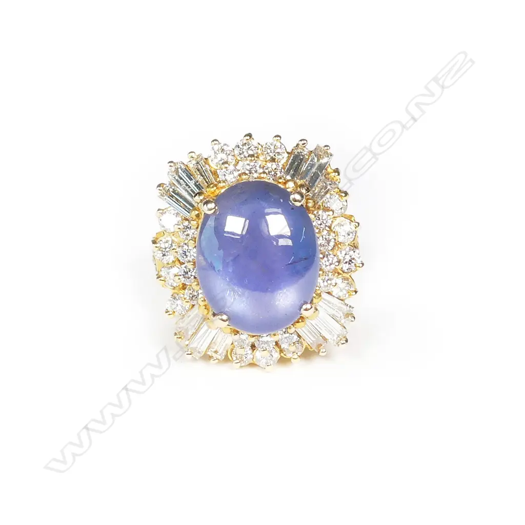 A 1970s impressive 18ct star sapphire and multi diamond 'Ballerina' ring Image 1++