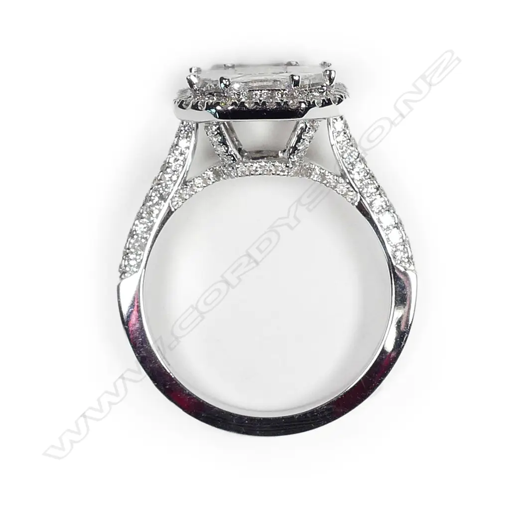 A modern 18ct. white gold and diamond set large diamond cluster ring Image 1++