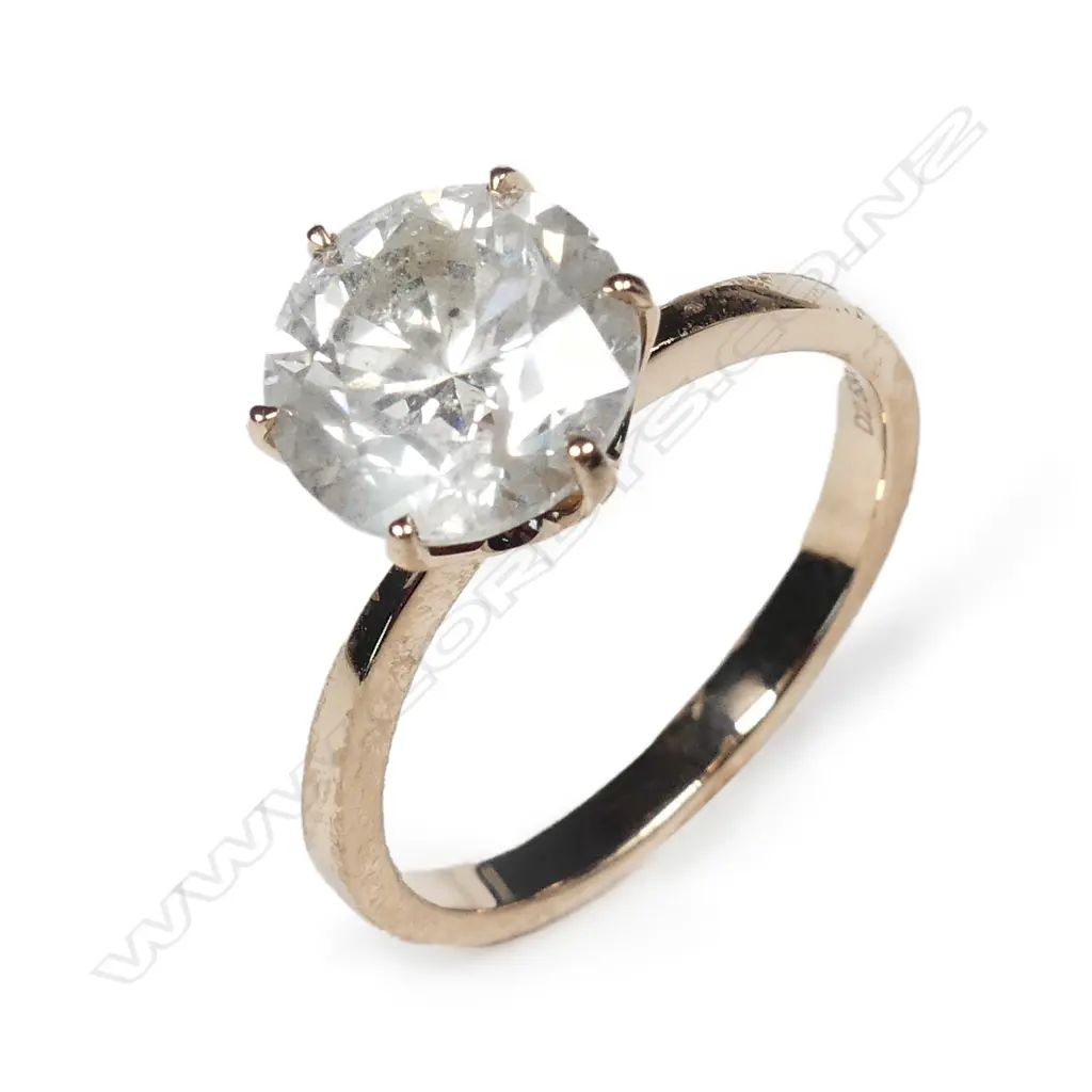 A 14ct rose gold diamond solitaire ring Image 1++