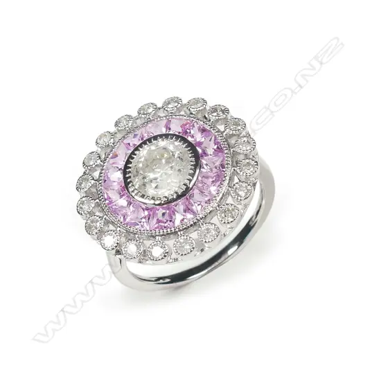 An 18ct white gold diamond and sapphire ring