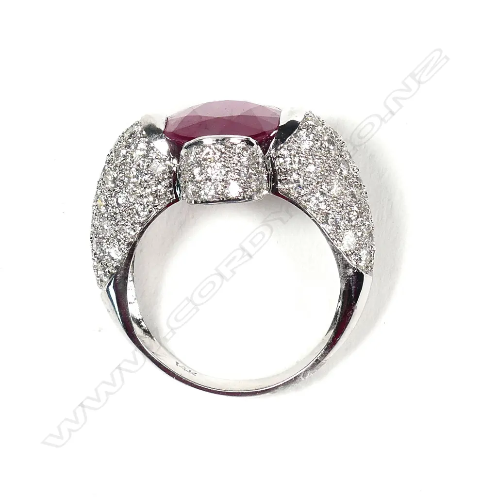 An impressive 14k white gold large ruby and diamond dress ring Image 1++