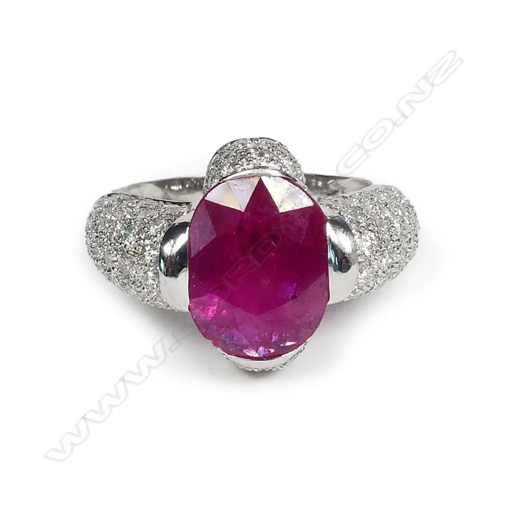 An impressive 14k white gold large ruby and diamond dress ring Image 1++