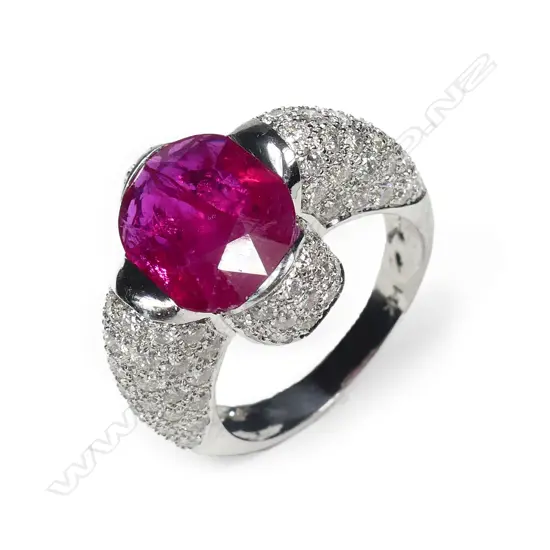 An impressive 14k white gold large ruby and diamond dress ring