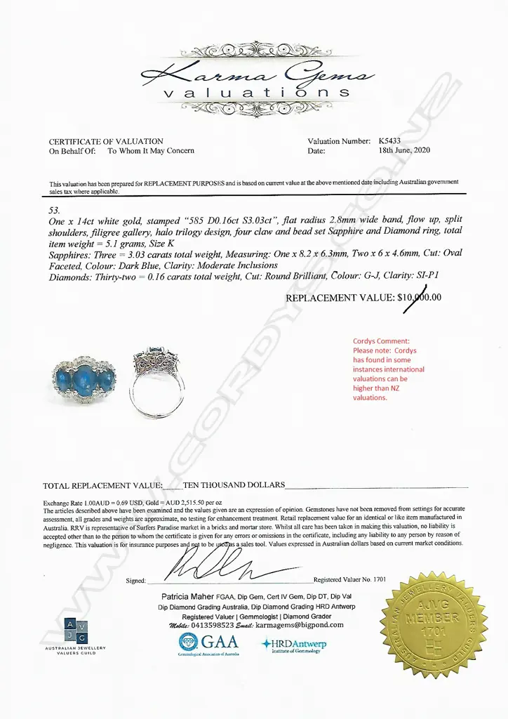 A 14ct white gold sapphire and diamond trilogy ring Image 1++