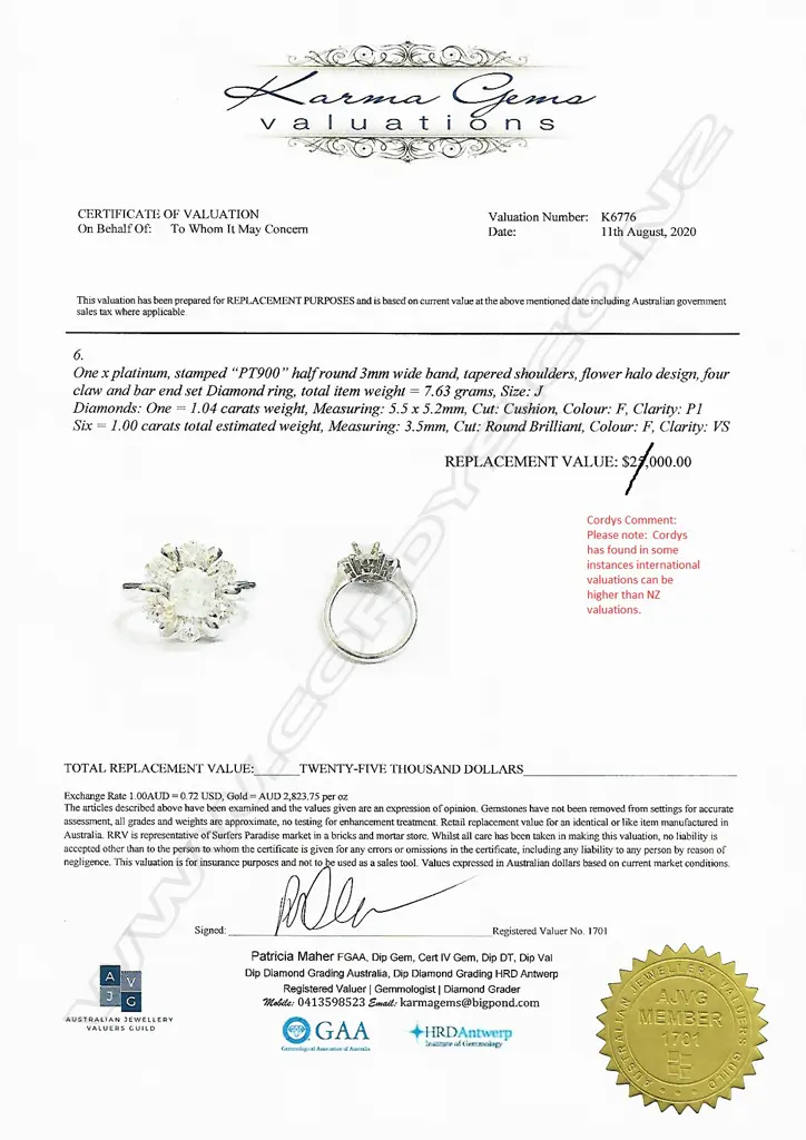 A platinum and diamond ring Image 1++