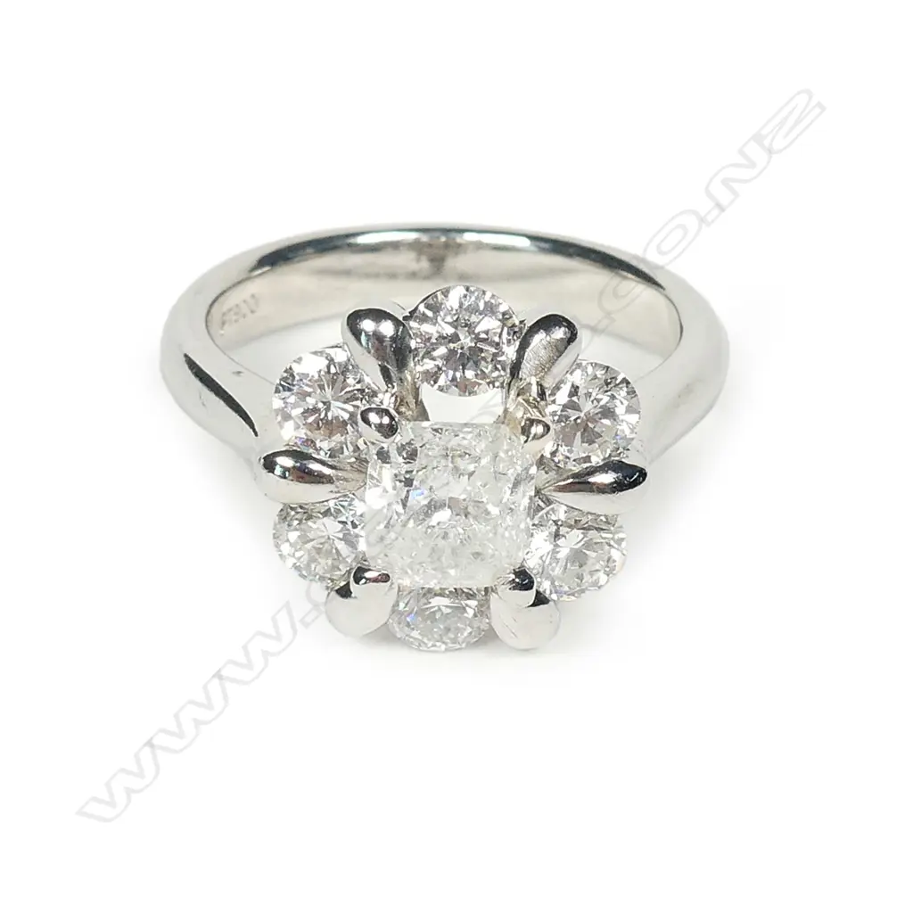 A platinum and diamond ring Image 1++