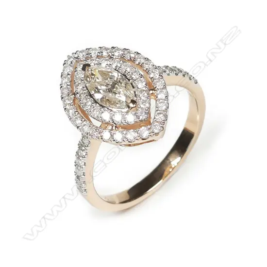 A 14ct rose gold and diamond double halo ring