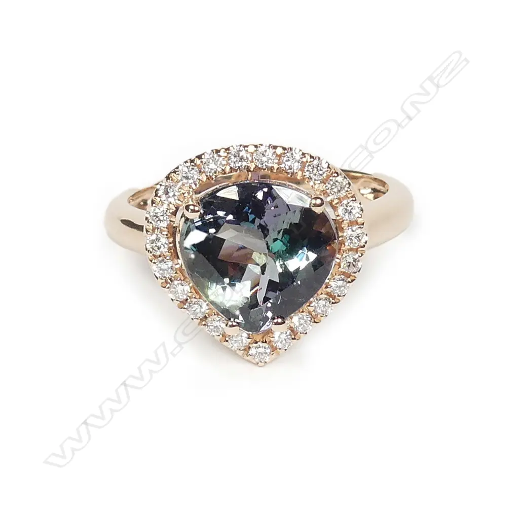 A 14ct rose gold tanzanite and diamond ring Image 1++