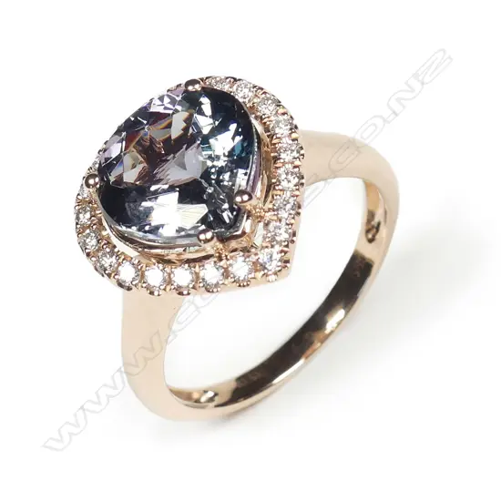 A 14ct rose gold tanzanite and diamond ring