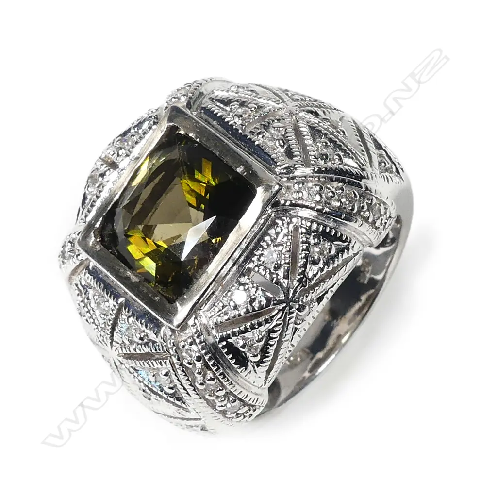 A large 14ct white gold green tourmaline and diamond ring Image 1++