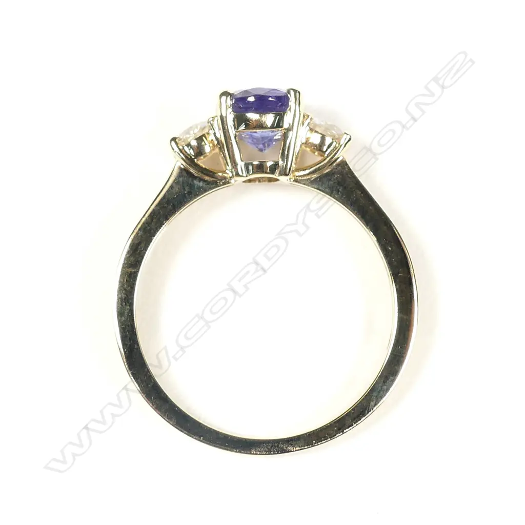 A 14ct gold tanzanite and diamond ring Image 1++