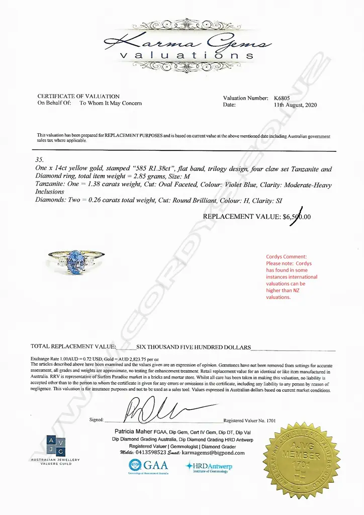 A 14ct gold tanzanite and diamond ring Image 1++