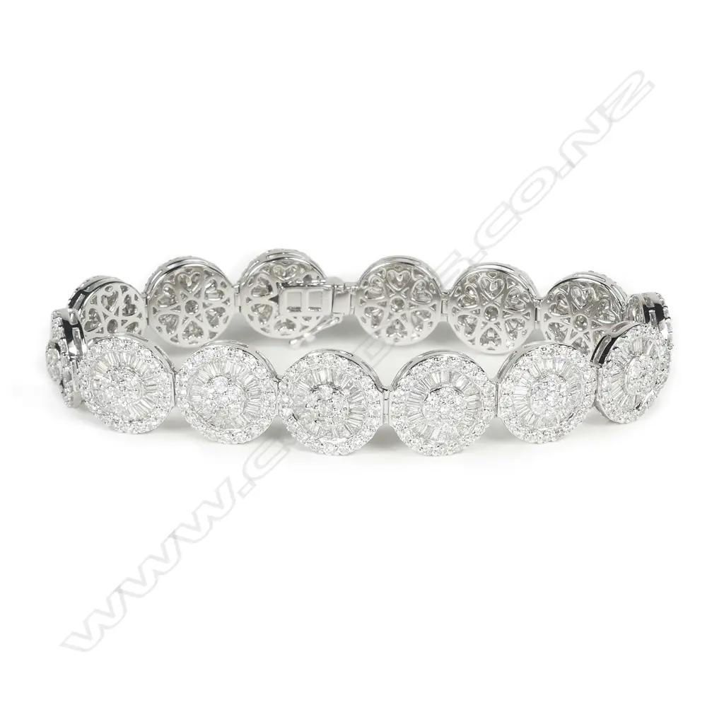 An impressive 18ct. white gold and diamond encrusted multi-link bracelet Image 1++