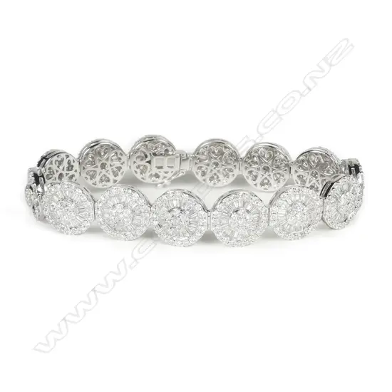 An impressive 18ct. white gold and diamond encrusted multi-link bracelet