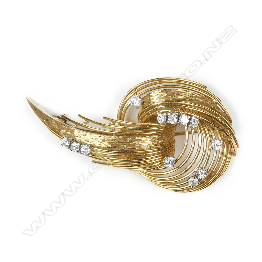 A 1960s stylish 18ct handmade yellow gold and diamond spray brooch Image 1++
