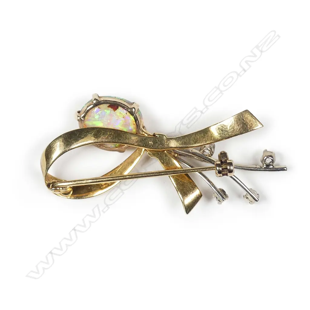 An 18ct opal and diamond set ribbon brooch Image 1++