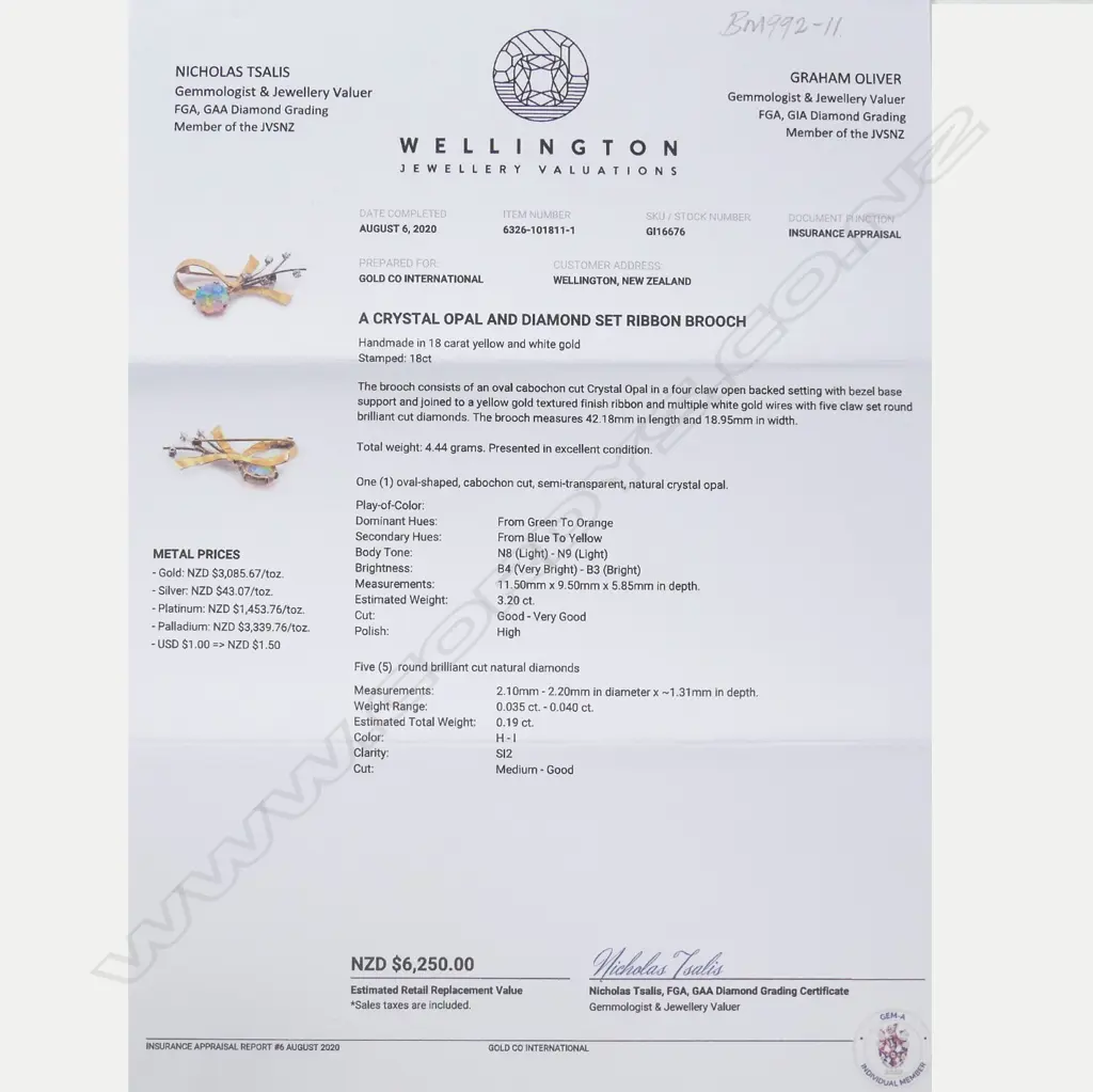 An 18ct opal and diamond set ribbon brooch Image 1++