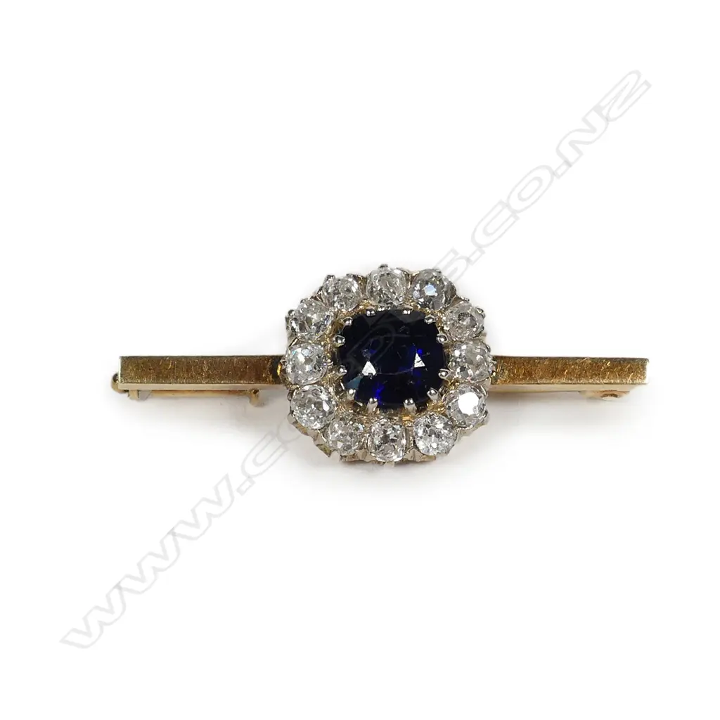 A 14ct gold sapphire and diamond brooch Image 1++