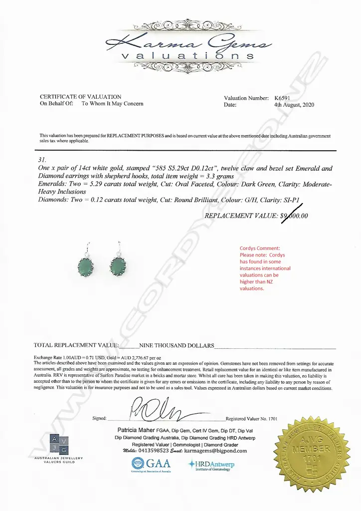 A pair of 14ct white gold emerald and diamond earrings Image 1++