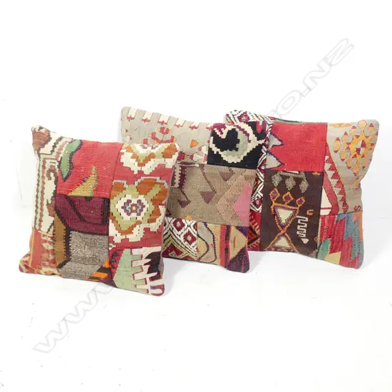 Three scatter cushions with faces made of old Persian carpets