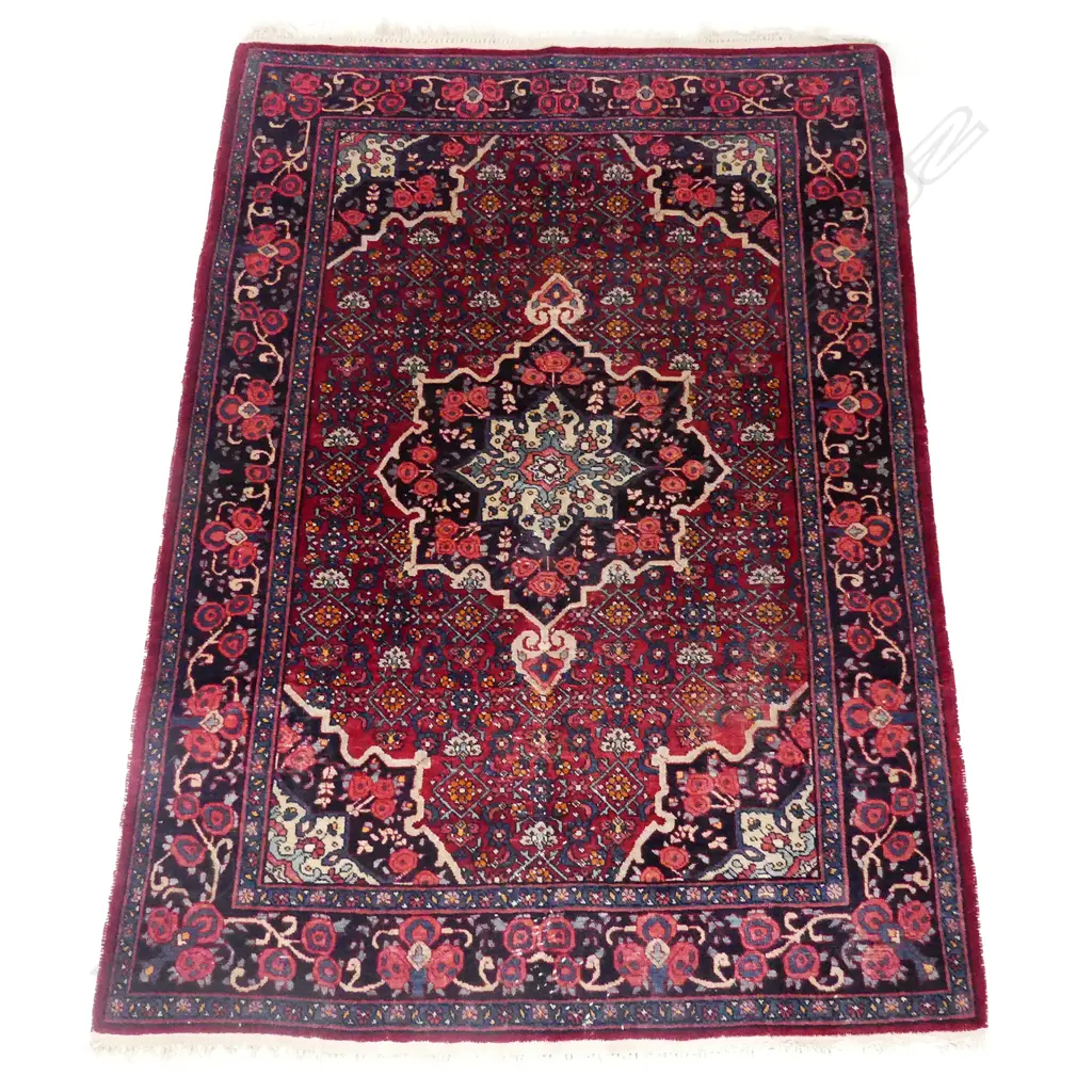 A Persian Herati patterned hand knotted rug Image 1++
