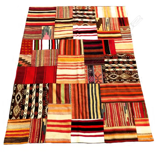 An unusual hand knotted Turkish patchwork kilim rug