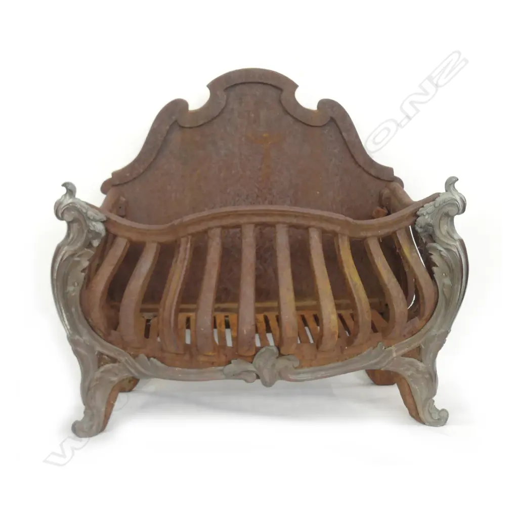 An old cast iron fire grate Image 1++