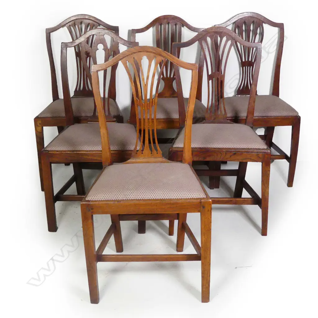 A harlequin set of six Hepplewhite style elm chairs Image 1++
