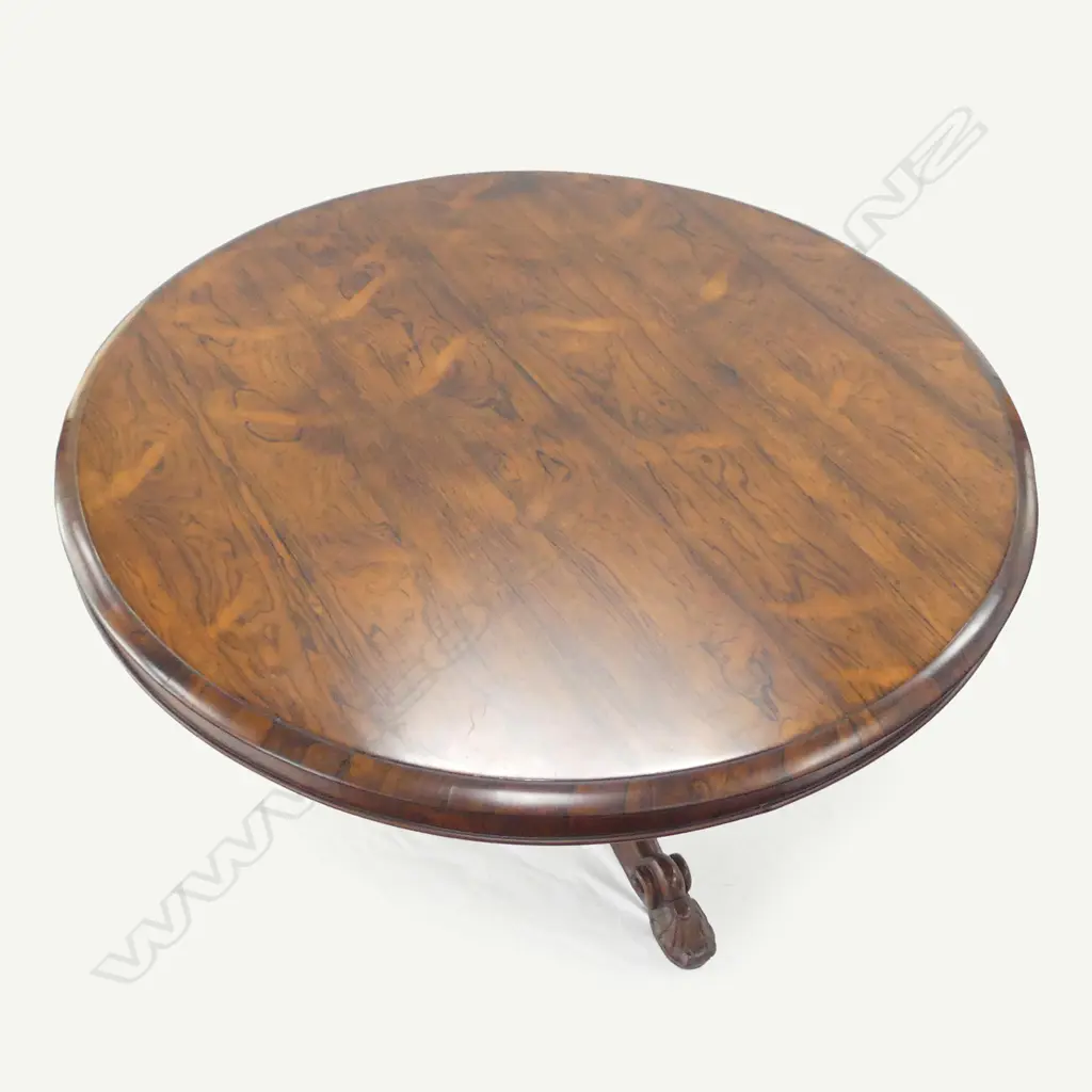 An early Victorian rosewood tilt-top table Image 1++