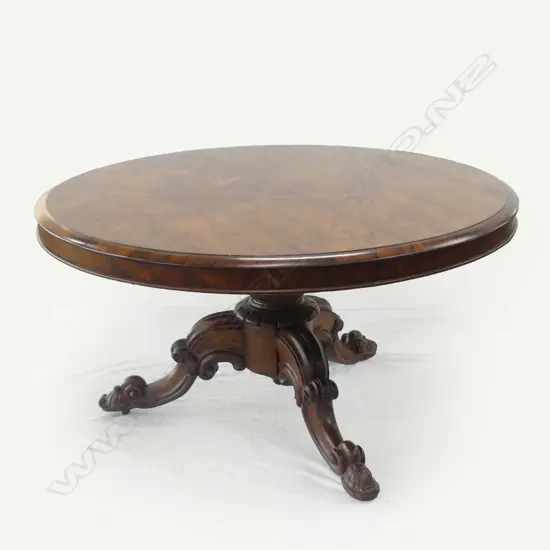 An early Victorian rosewood tilt-top table
