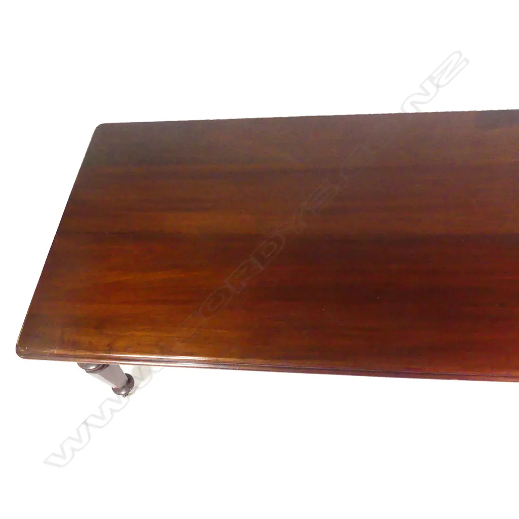 A Victorian style mahogany banquet dining table and ten balloon back dining chairs Image 1++
