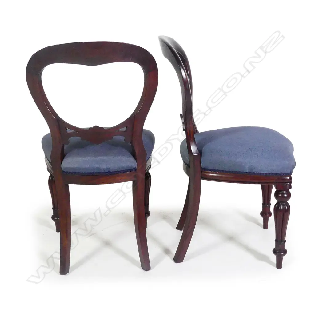 A Victorian style mahogany banquet dining table and ten balloon back dining chairs Image 1++