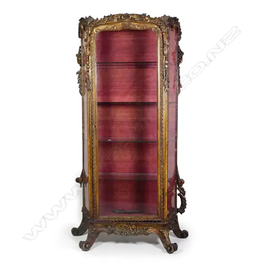 A 19thC French carved gilt framed tall vitrine