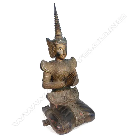 An antique life size wooden female bodhisattva