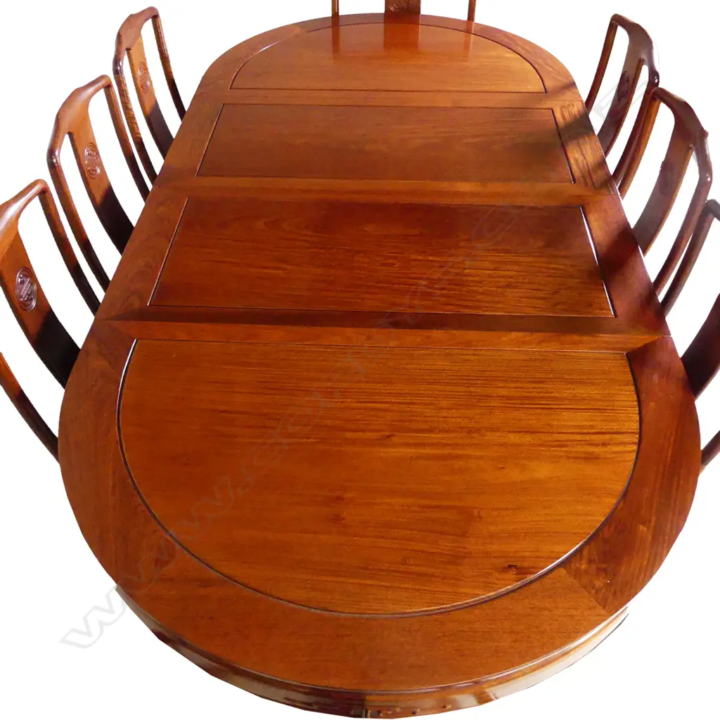 A Chinese rosewood extension dining table and chairs Image 1++