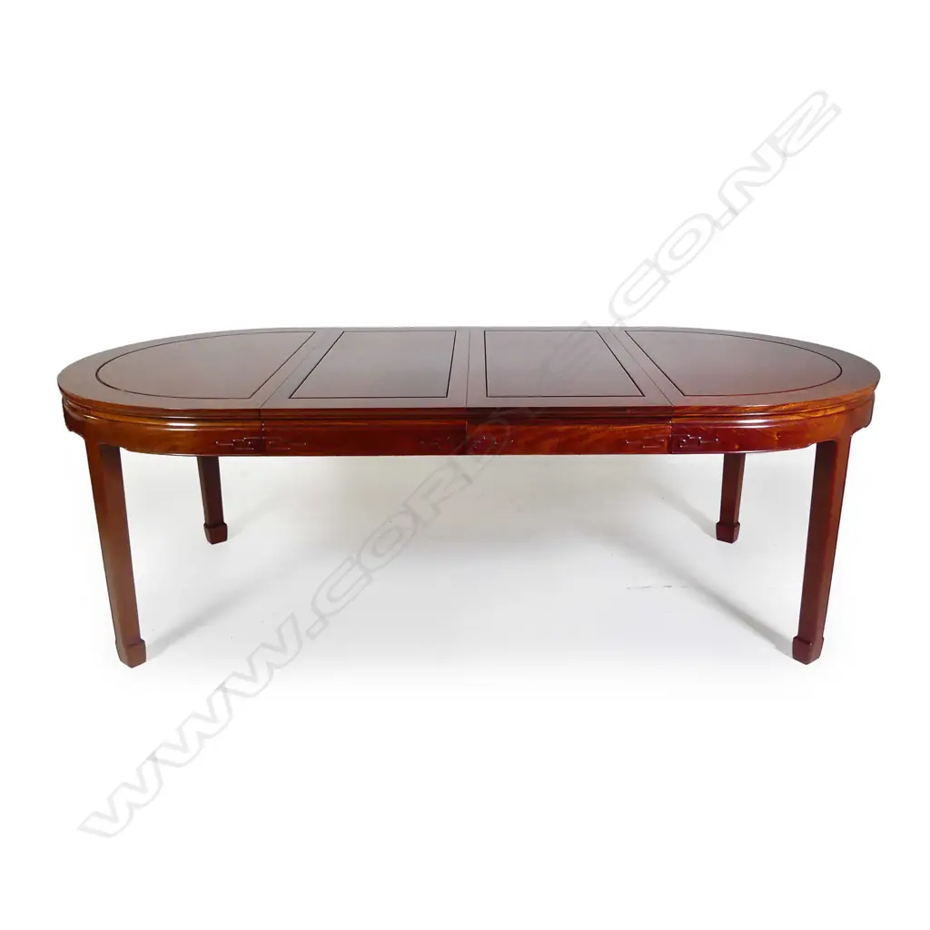 A Chinese rosewood extension dining table and chairs Image 1++