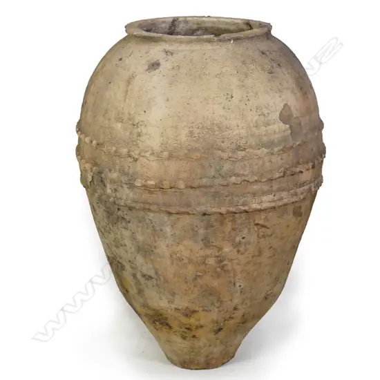 An old European tall olive oil storage jar