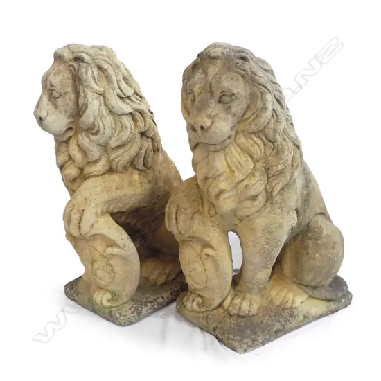 A pair of classical Church Stone seated ‘Westcott Lions’
