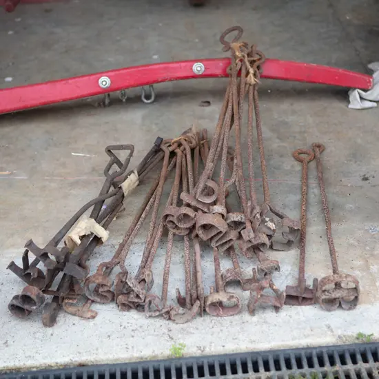 Approximately 28 fire branding irons,