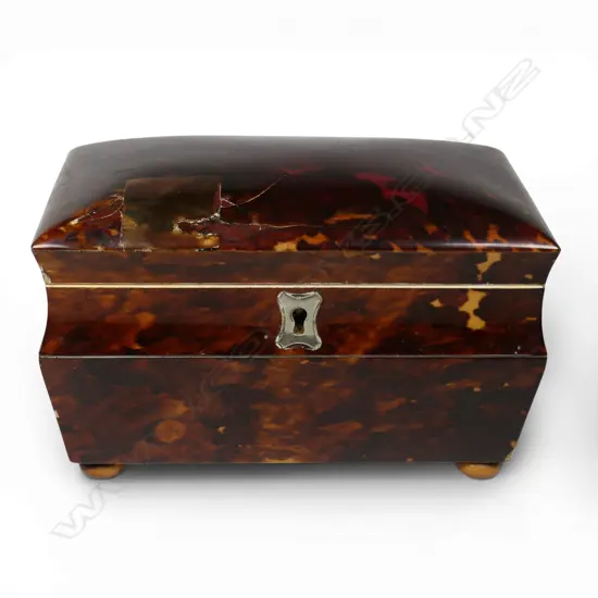A small Georgian tortoiseshell tea caddy,