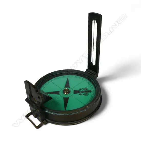 A Victorian leather cased green card prismatic compass,