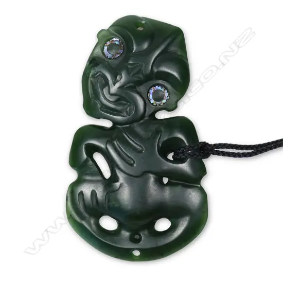 An uncommon Charlie Raponi Wilson carved double sided hei tiki,