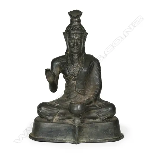 A Chinese bronze seated bearded immortal,