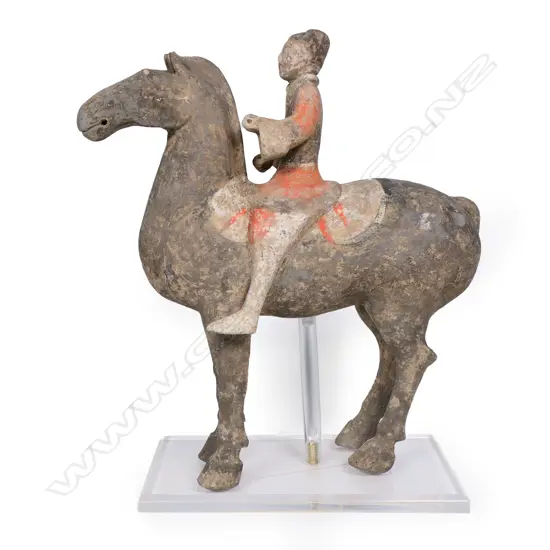 A reputedly Han Dynasty pottery horse and rider,