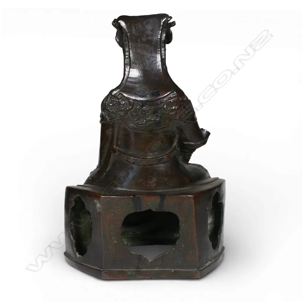 A Chinese reputedly Ming bronze model of a seated and bearded official, Image 1++