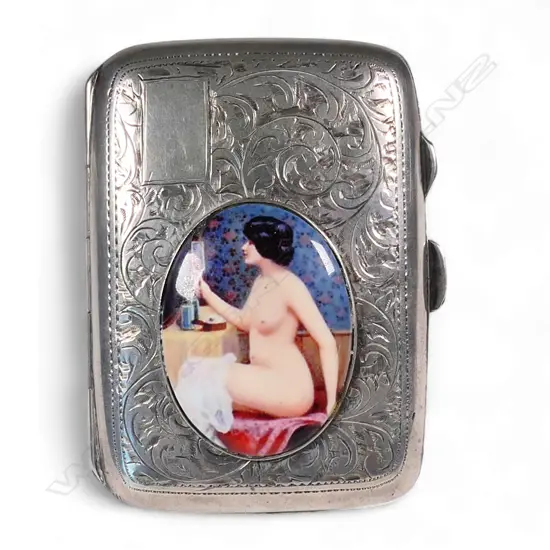 A silver cigarette case,