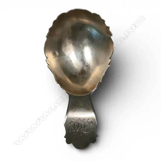 A George III silver caddy spoon,