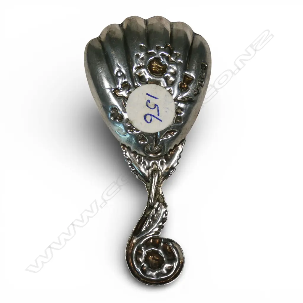 A late Victorian fancy silver embossed caddy spoon, Image 1++