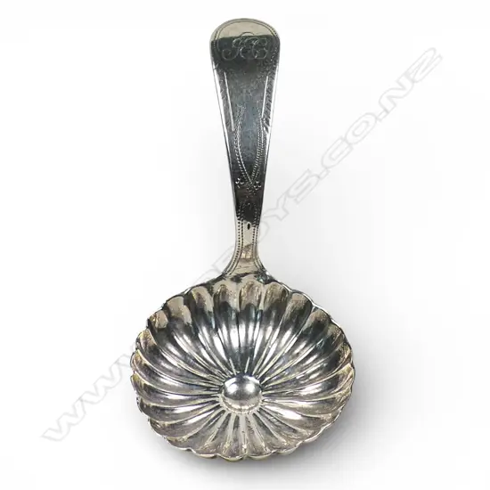 A silver George III caddy spoon,