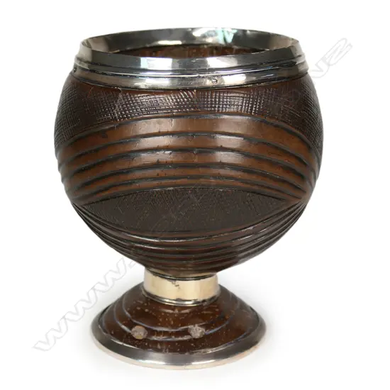A George IV silver mounted coconut cup,